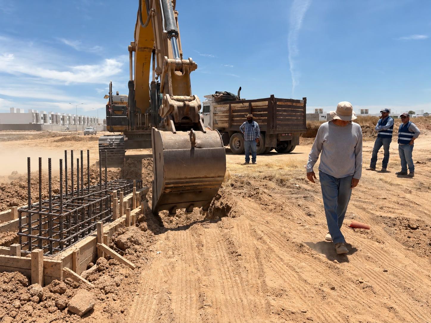 Engineer supervising site work and concrete quality control
